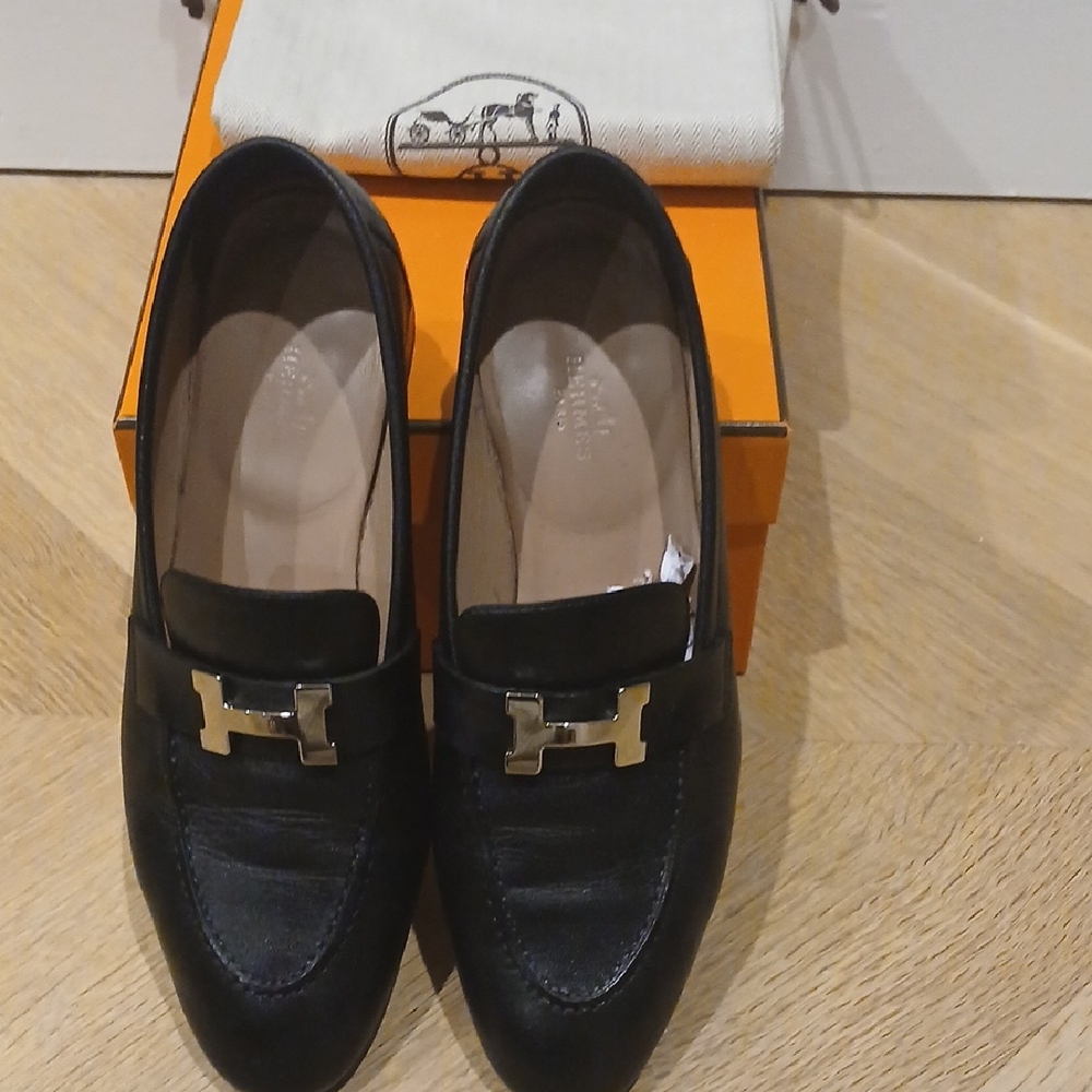 Hermes Black Leather Women’s Loafers with Silver H Hardware.